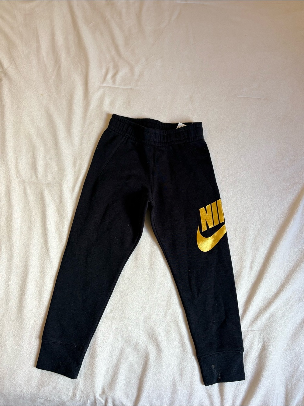Nike Black Kids Joggers with Gold Swoosh